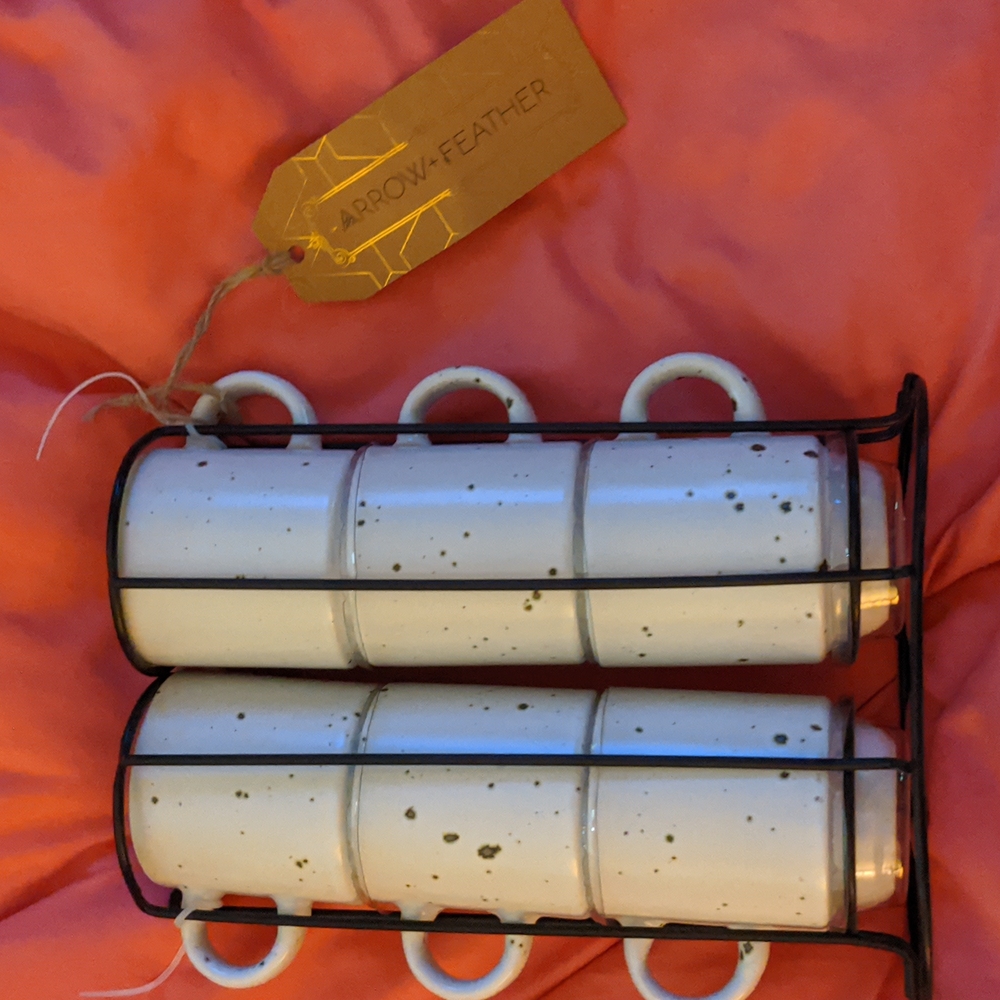 Stackable set of 4 mini mugs.